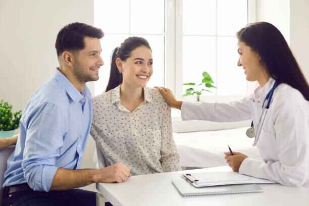 Couple Consultiong with Doctor